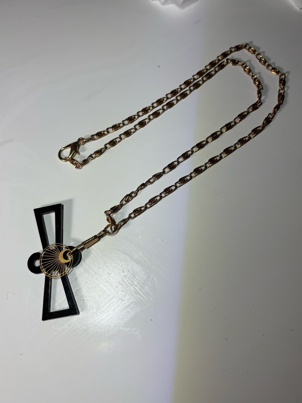 Gold Chain Necklace with Black Geometric Pendant